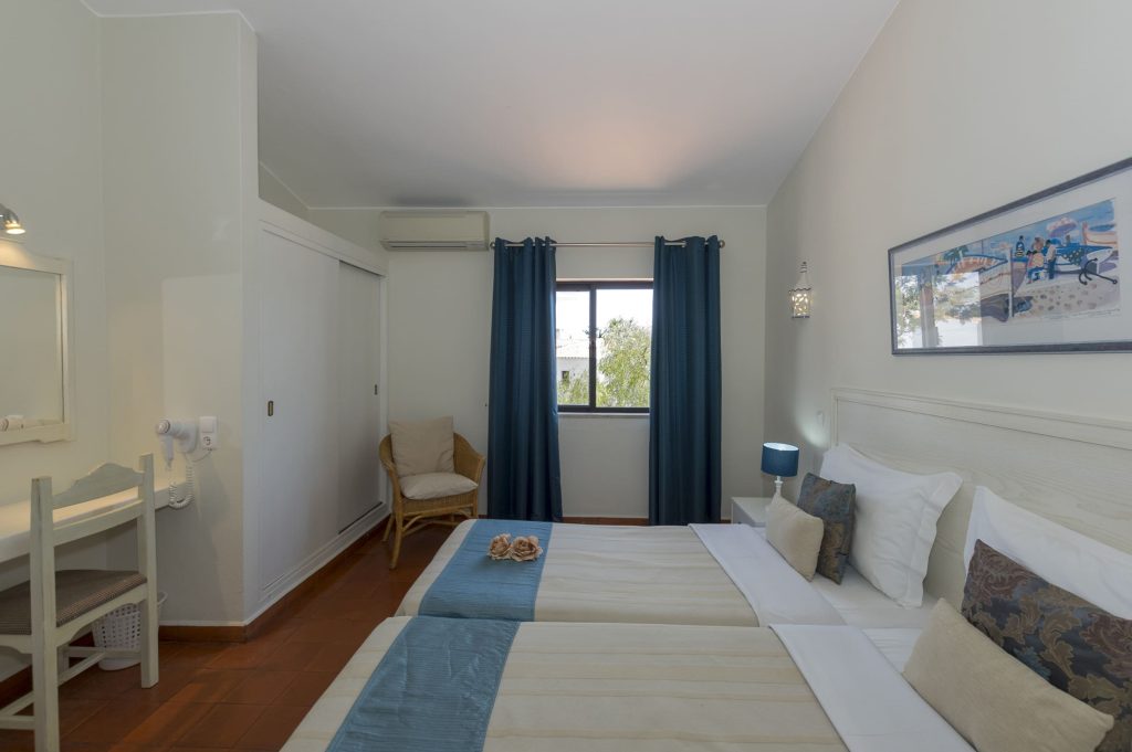 Apartamento T1 vista jardim - Quarto